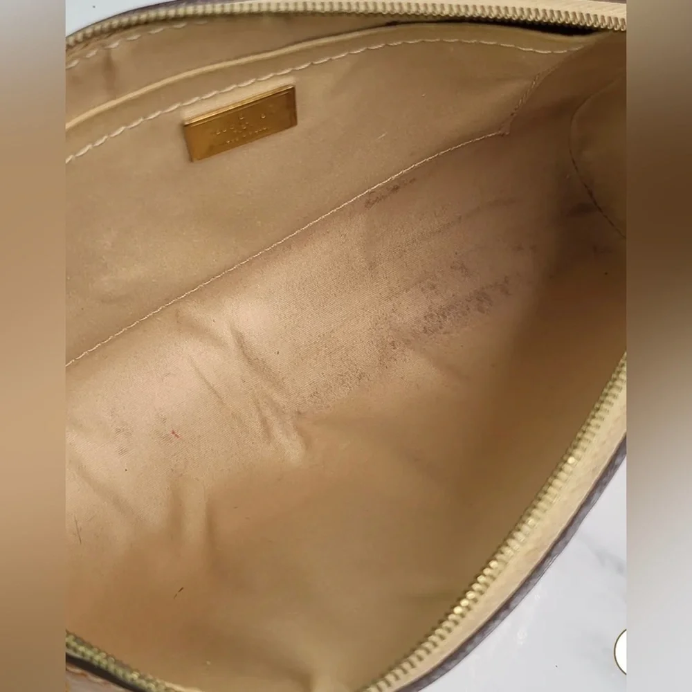 𝅺louis VUITTON VERNIS STA. MONICA CLUTCH